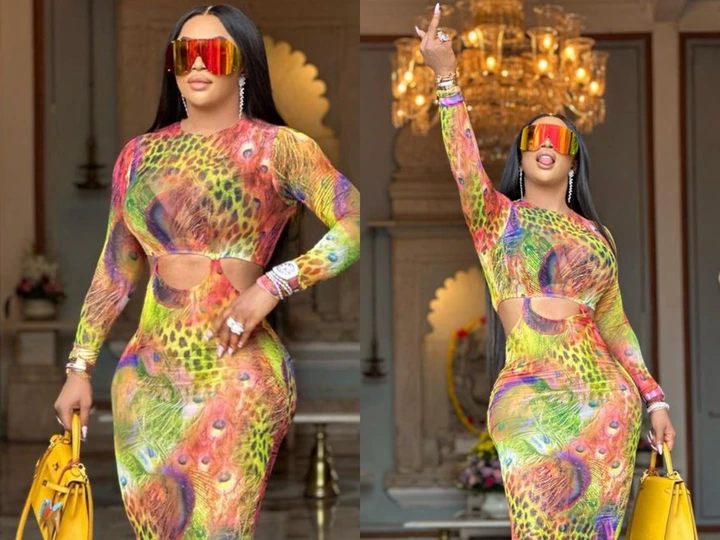 OAP Toke Makinwa dazzles in multi coloured skin tight dress (Photos)