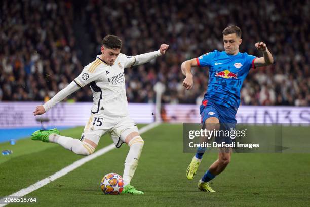 Madrid spain fede valverde of real madrid cf and christoph baumgartner of rb leipzig battle