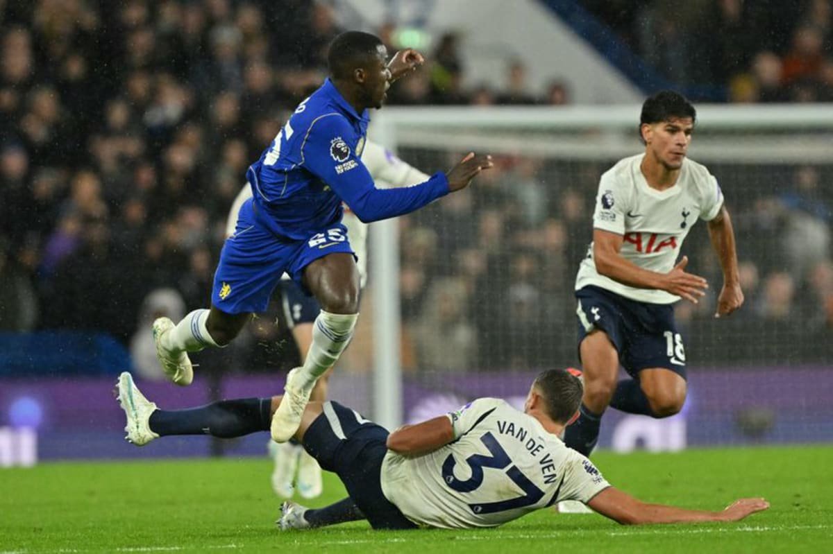 Micky van de Ven was only shown a yellow card for his late foul on Moises Caicedo