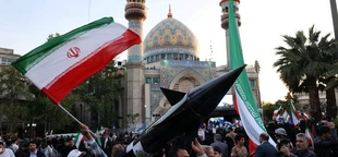 Iran warns it may change nuclear weapons stance in face of Israel; US announces sanctions