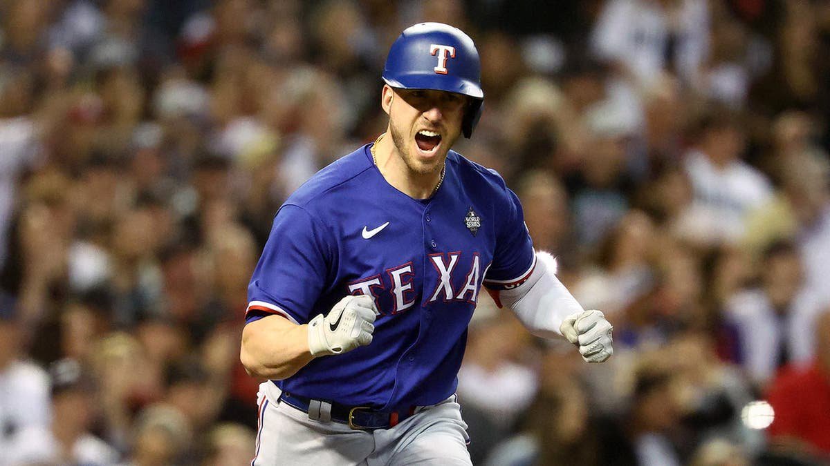 Mitch Garver reacts after hitting an RBI single during the sixth inning of World Series Game 5.