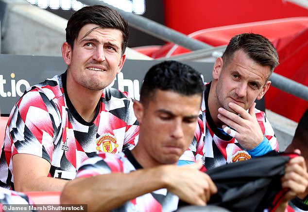 United's captain sits with Tom Heaton and Cristiano Ronaldo on the bench at Southampton