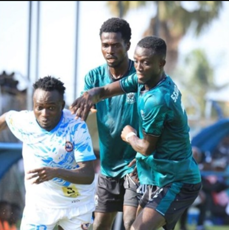 Chelsea 's Jonah Attuquaye breaks away from Samertex duo of Edem Asamoah and James Sewornu