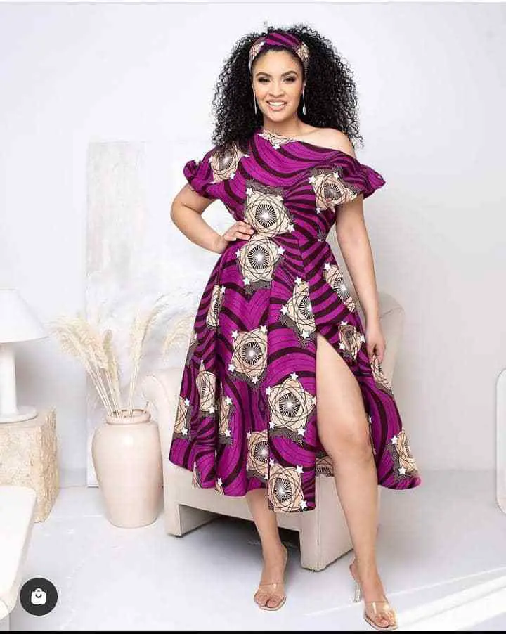 lady wearing ankara gown with a slit
