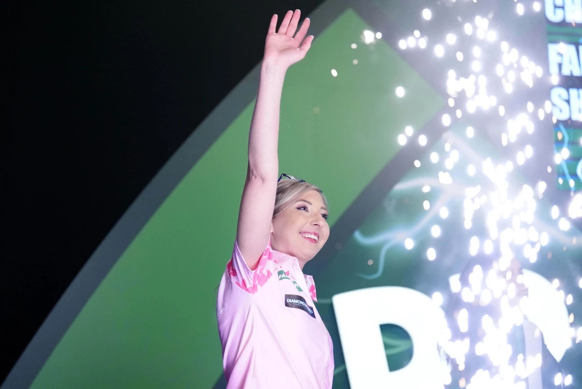 Fallon Sherrock ahead of her match with Dave Chisnall on day eight of the Paddy Power World Darts Championship at the Alexandra Palace in London, Thursday Dec. 18, 2025. (John Walton/PA via AP)
Britai ...
