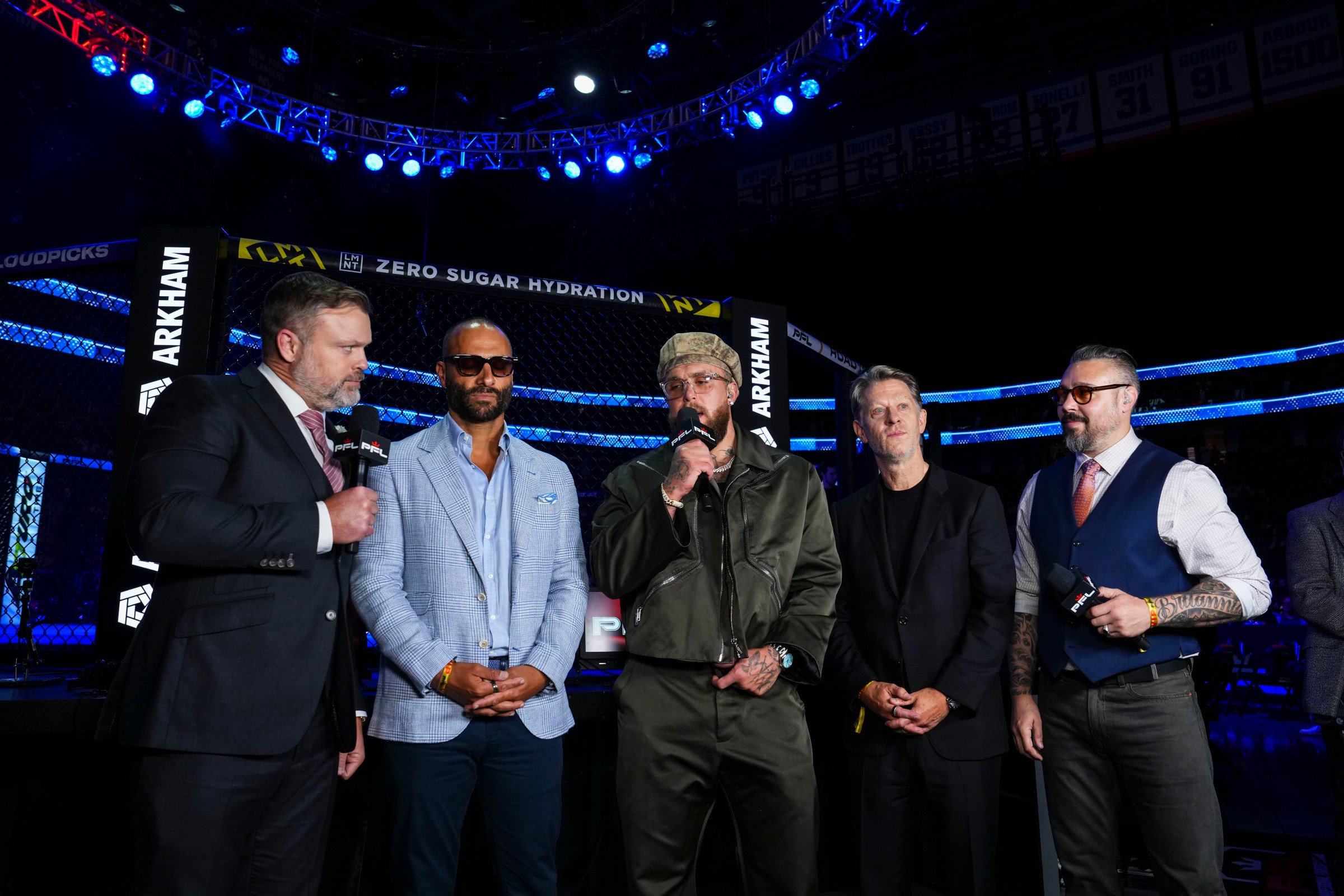 BELMONT PARK, NY - JULY 31: Jake Paul with Nakisa Bidarian and John Martin on the broadcast set “jp#2” during PFL New York at the UBS Arena on July 31, 2026 in Belmont Park, New York. (Photo by Cooper Neill/Getty Images)