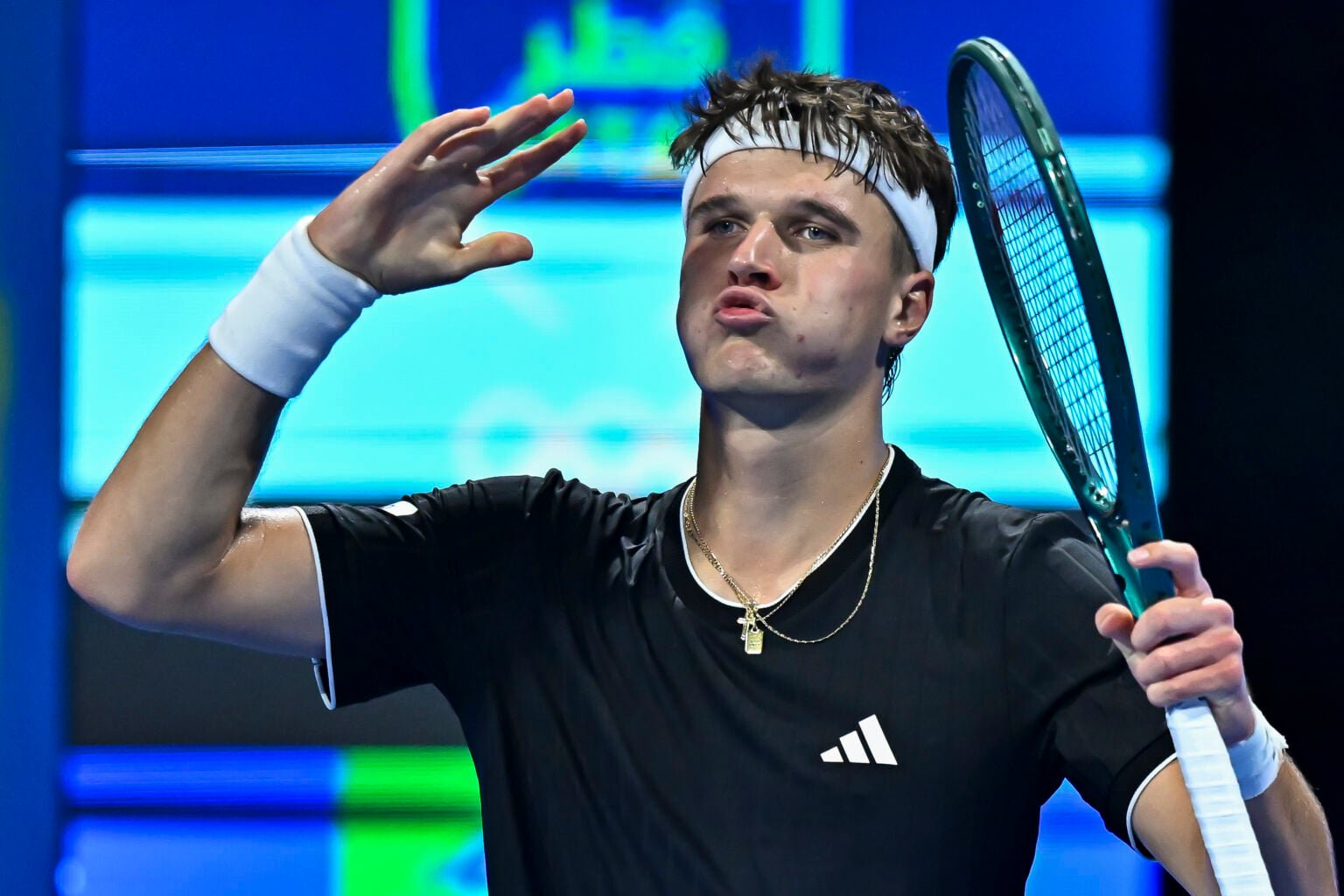 Jakub Mensik reacts during his match against Jannik Sinner at the 2026 Qatar Open.