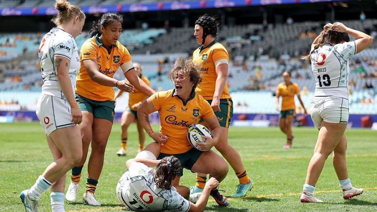 Australia's Brittany Merlo celebrates her try