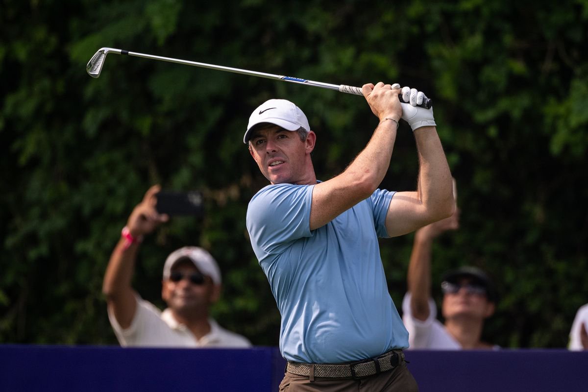 Rory McIlroy of Northern Ireland tees off on hole 2 on day three of the DP World India Championship at Delhi Golf Club 