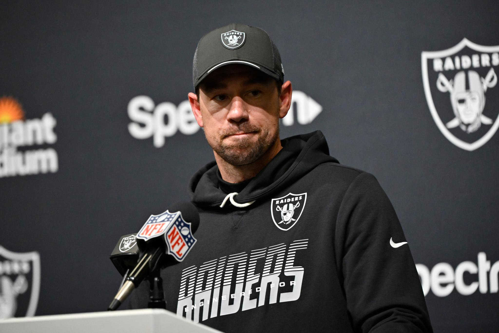 Las Vegas Raiders head coach Klint Kubiak talks to reporters following an NFL football game against the Los Angeles Rams
