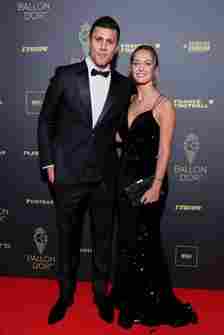 Rodrigo Hernández Cascante aka Rodri and Laura Cascante attend the 67th Ballon D'Or Photocall at Theatre Du Chatelet on October 30, 2023 in Paris, France