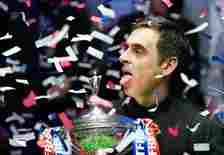 Ronnie O'Sullivan celebrates winning the World Snooker Championship