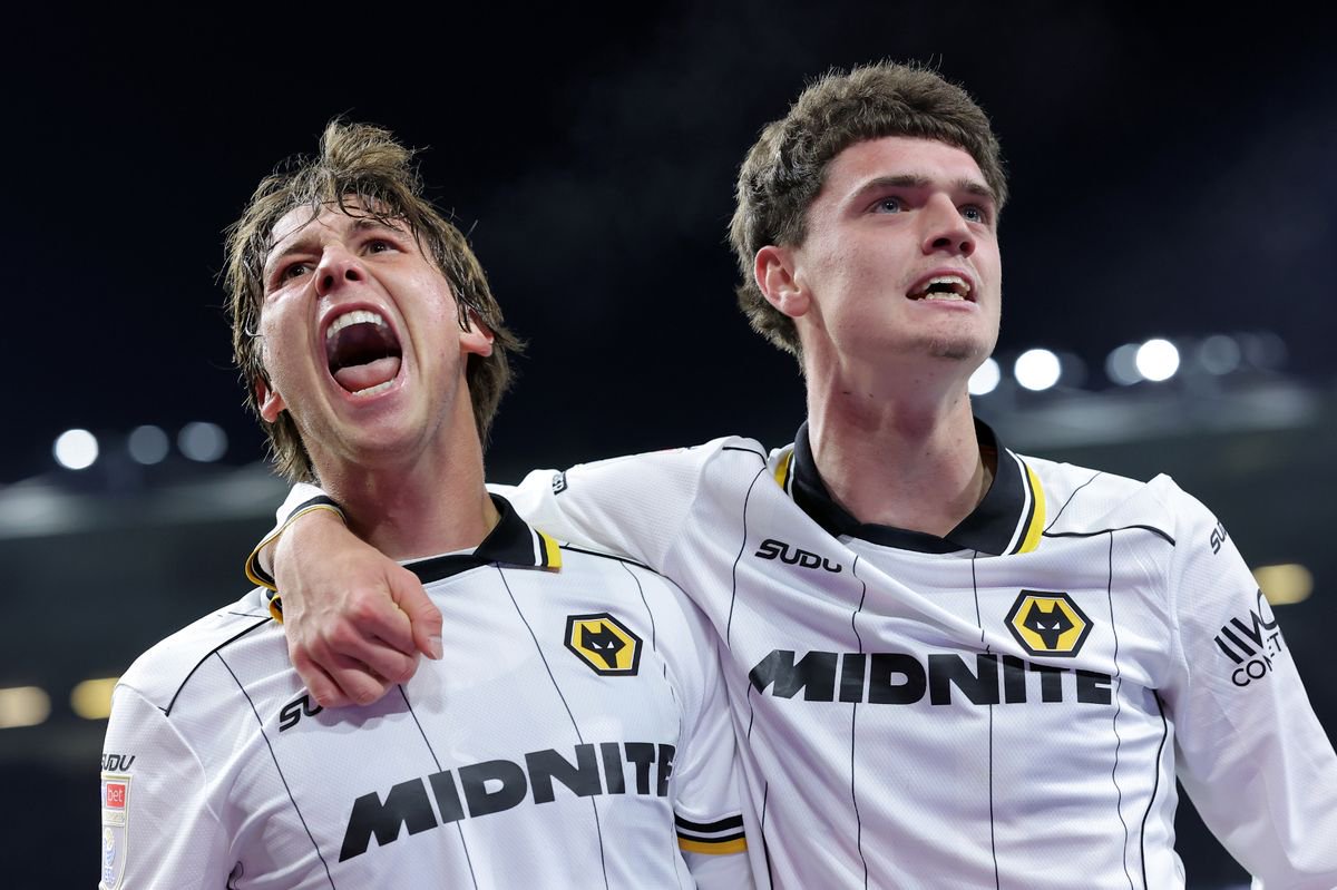  Fer Lopez of Wolverhampton Wanderers celebrates scoring his team’s first goal with teammate Sean Neave