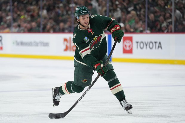 Wild defenseman Brock Faber shoots during the third period of Game 3 of their second-round playoff series against the Colorado Avalanche on Saturday, May 9, 2026, at Grand Casino Arena. Faber had a goal and two assists in Minnesota's 5-1 victory. (AP Photo/Abbie Parr)
