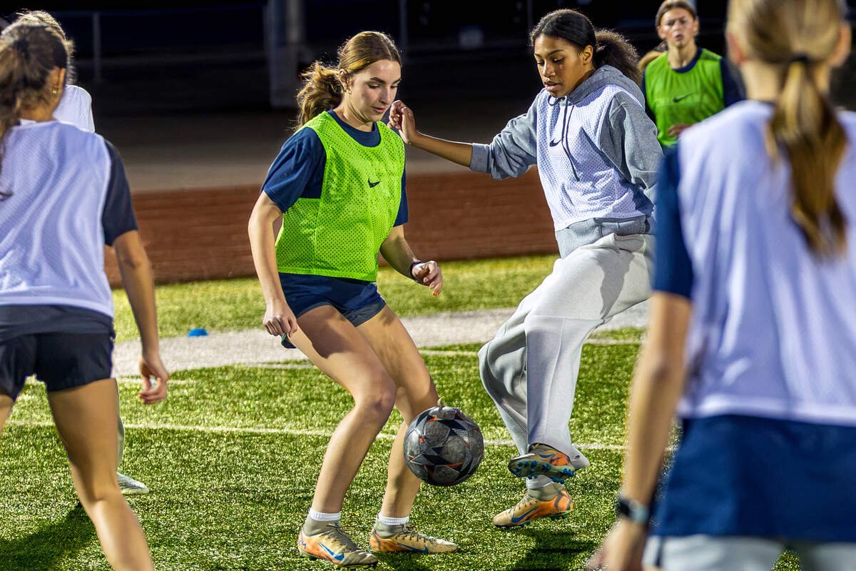 Chiawana High School junior midfielder Mercedez “Mercy” Suarez (10), left, and sophomore defender D’Erykah Orange (3) compete for possession of the ball during the Riverhawks’ final practice Monday, Oct. 26, 2026, at Chiawana High School in Pasco, Wash. Chiawana opens the District 6 Class 4A girls soccer playoffs Tuesday at 6 p.m. against Ferris at Chiawana High School.