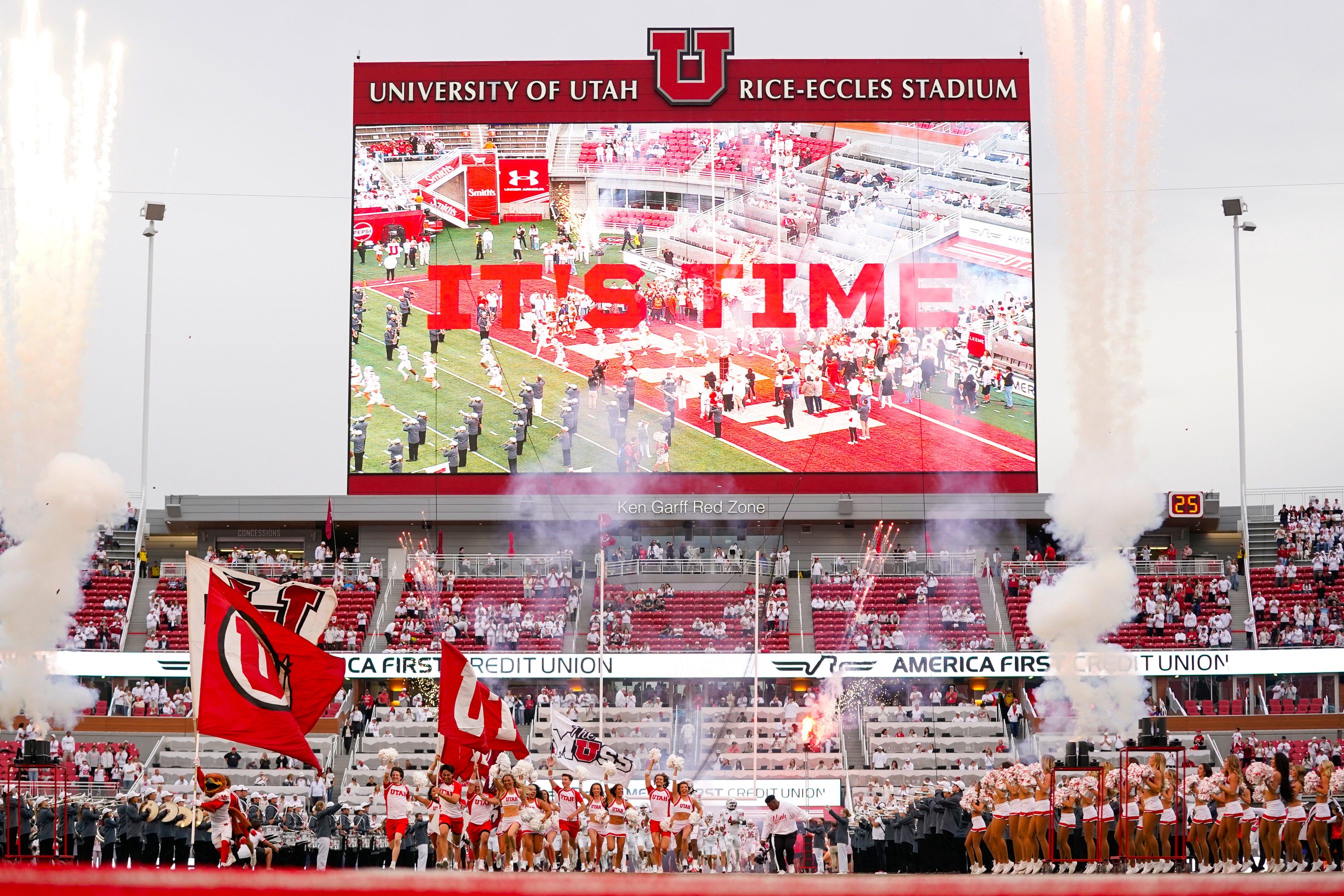 Oct 10, 2026; Salt Lake City, Utah, USA; The Utah Utes cheer team leads the team onto the field prior to a game against the Kansas Jayhawks at Rice-Eccles Stadium. Mandatory Credit: Aaron Baker-Imagn Images
