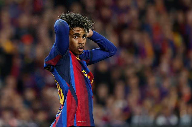 Barcelona's Lamine Yamal reacts after a missed scoring opportunity during a Spanish La Liga soccer match between FC Barcelona and Real Madrid in Barcelona, Spain, Sunday, Oct. 25, 2026. (AP Photo/Joan Monfort)