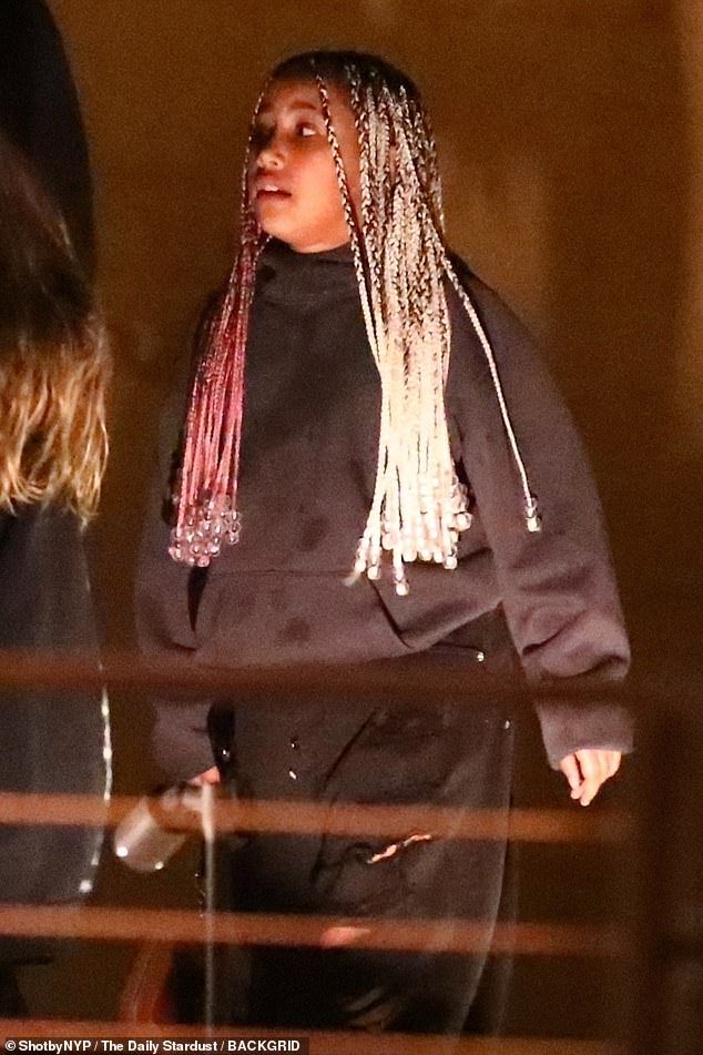 Stepmom: North was joined by a friend as her security team dropped her off at the high-end restaurant where her dad and his new love were waiting