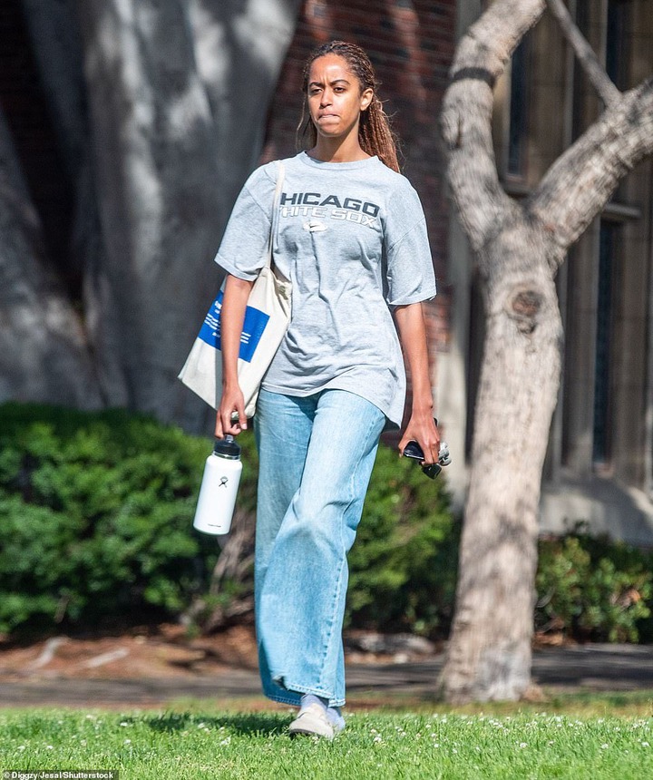 She completed her low-key look with a pair of clogs from Birkenstock - the same style that her younger sister Sasha wore when she and Clifton were photographed out in public together for the first time last week.