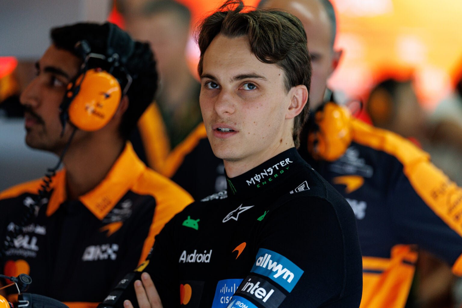 McLaren driver Oscar Piastri look on from the garage during qualifying for the 2026 F1 United States Grand Prix