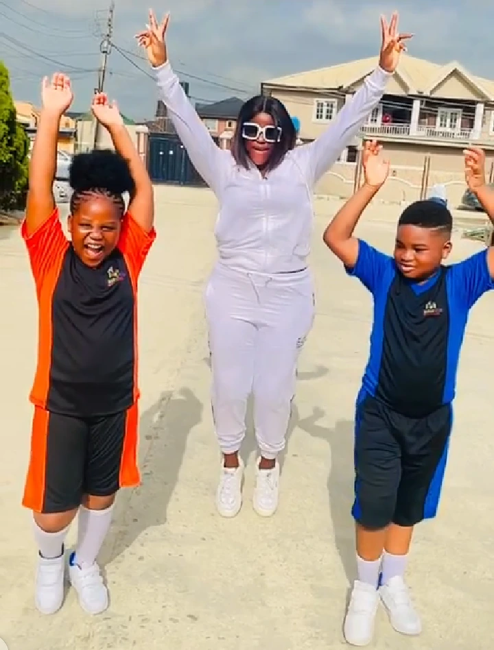 Reactions As Bukola Arugba Steps Out With Her Twins To Their School Inter-House Sport