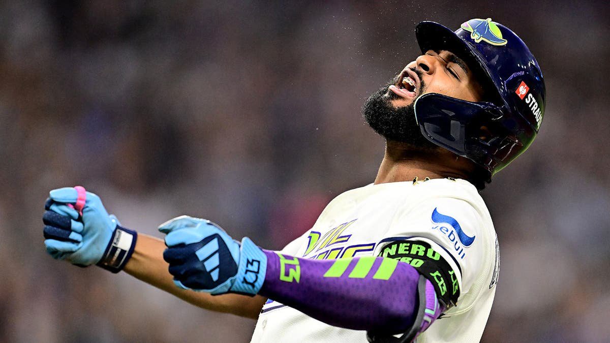 Junior Caminero reacts after hitting a two-run home run during the seventh inning of Game 6 of the American League Championship Series.