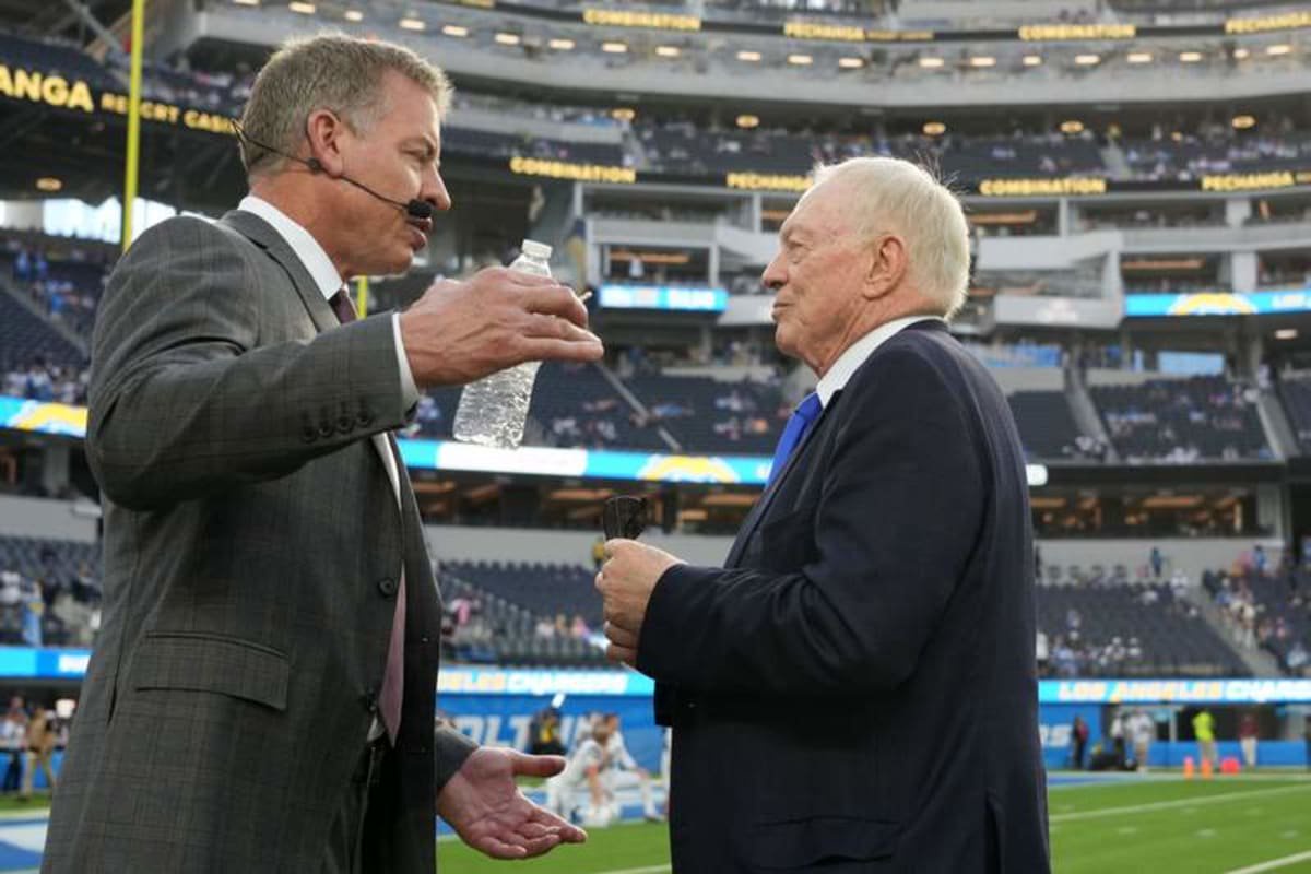 Oct 16, 2023; Inglewood, California, USA; Dallas Cowboys owner Jerry Jones (right) talks with former quarterback Troy Aikman before the game against the Los Angeles Chargers at SoFi Stadium. © Kirby Lee-USA TODAY Sports