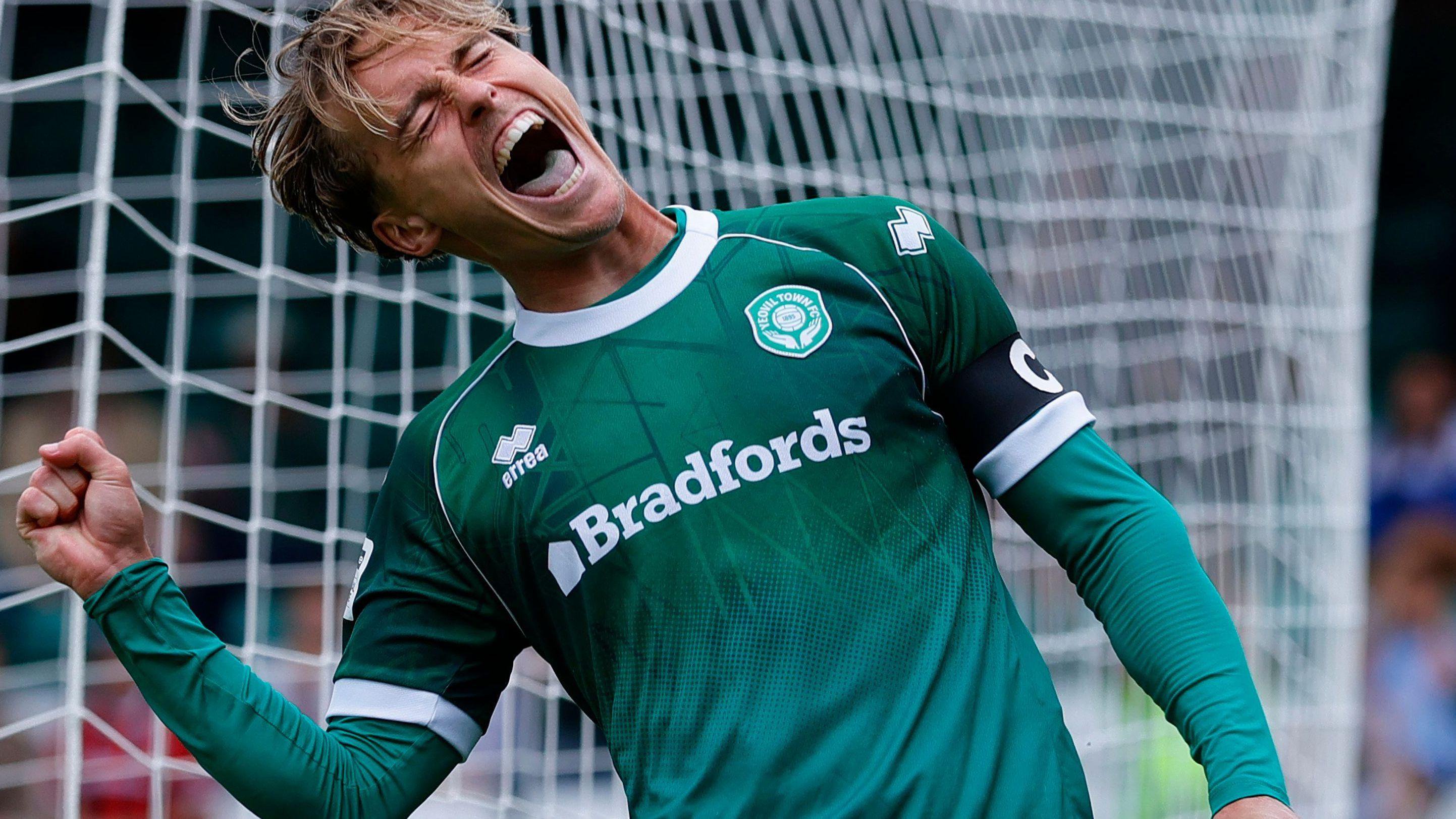 Luke McCormick celebrates a goal for Yeovil