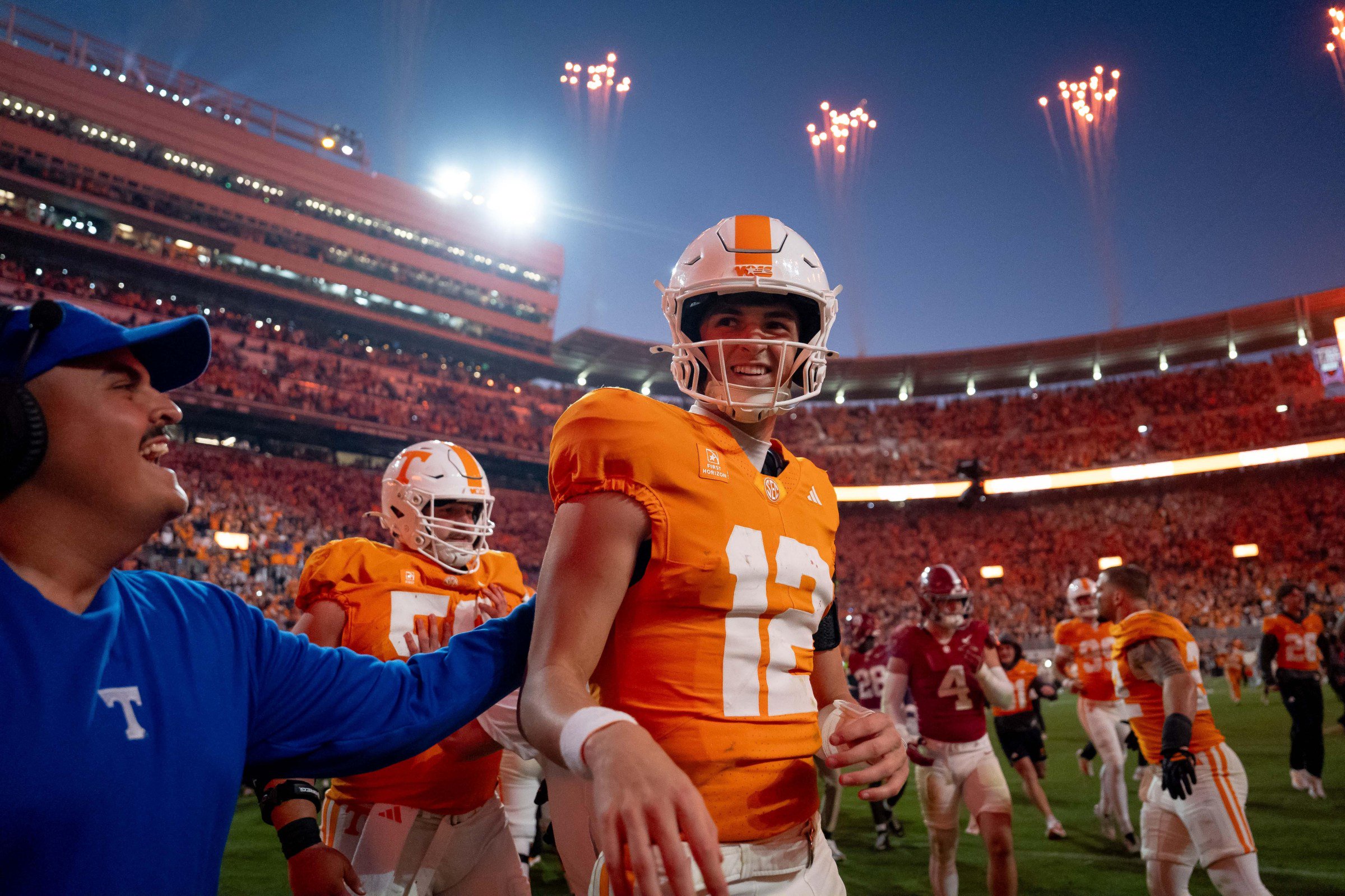 KNOXVILLE, TENNESSEE - OCTOBER 17: George MacIntyre #12 of the Tennessee Volunteers celebrates after defeating the Alabama Crimson Tide at Neyland Stadium on October 17, 2026 in Knoxville, Tennessee. (Photo by Camden Hall/Getty Images)