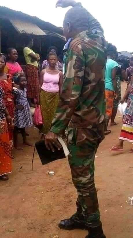 military man storms market to preach the word of God to people (photos)
