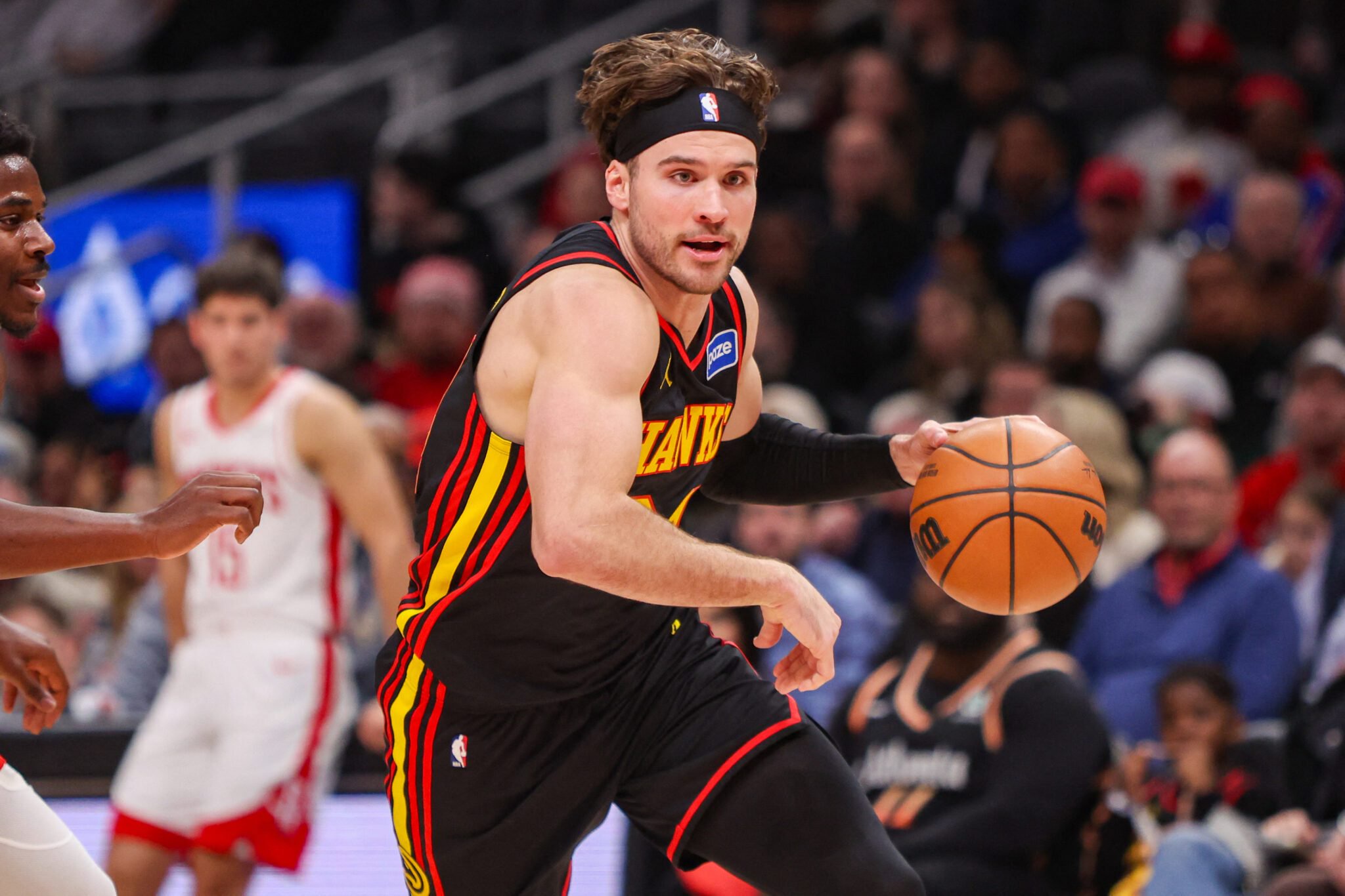 Jan 29, 2026; Atlanta, Georgia, USA; Atlanta Hawks forward Corey Kispert (24) drives to the basket against the Houston Rockets in the second quarter at State Farm Arena. Mandatory Credit: Brett Davis-Imagn Images