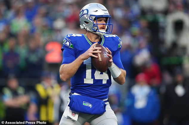 Seattle Seahawks quarterback Sam Darnold looks to pass during the first half of an NFL football game against the Kansas City Chiefs in Seattle, Sunday, Oct. 25, 2026. (AP Photo/Lindsey Wasson)