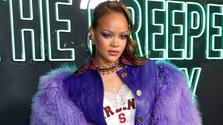 Rihanna Stuns In Fierce Purple Look At Fenty x Puma Sneaker Launch Party