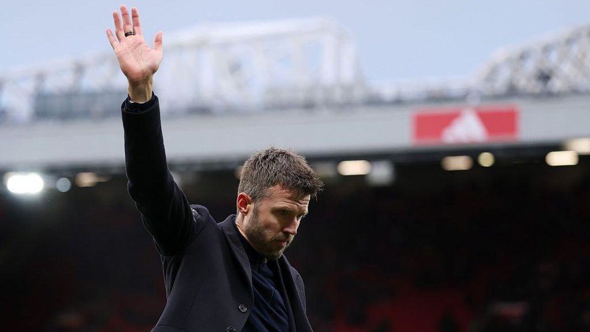 Manchester United head coach Michael Carrick waves to the fans after the Bournemouth defeat