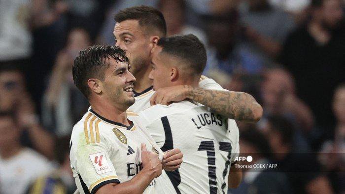 Penyerang Real Madrid Spanyol #21 Brahim Diaz merayakan gol pertama timnya selama pertandingan sepak bola liga Spanyol antara Real Madrid CF dan UD Las Palmas di stadion Santiago Bernabeu di Madrid pada 27 September 2023.