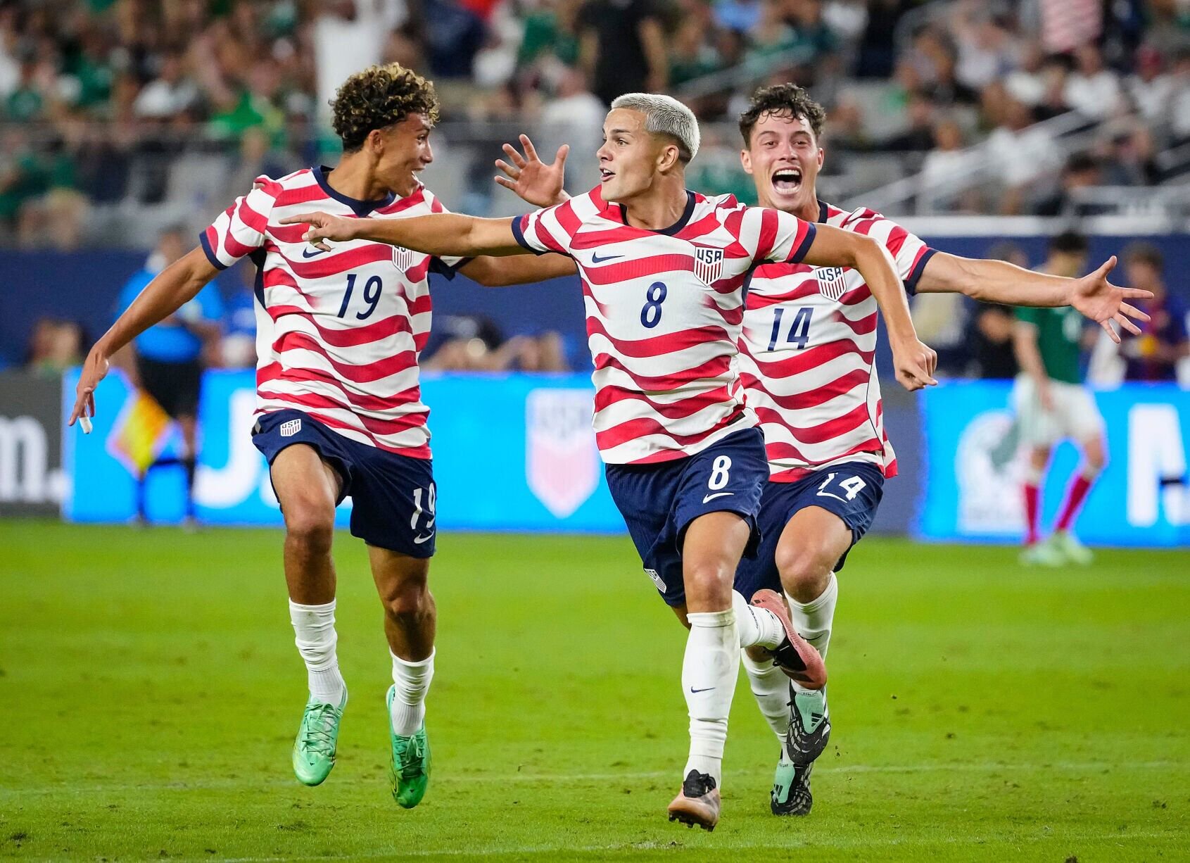USA forward Cavan Sullivan (8) celebrates his first goal against Mexico during an international friendly match at State Farm