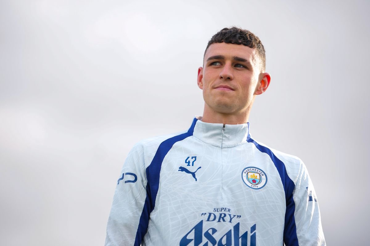 Phil Foden smiles