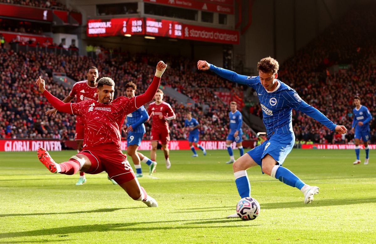Ronald Araujo of Liverpool attempts to block the cross of Charalampos Kostoulas of Brighton & Hove Albion during the Premier League 2026/27 match between Liverpool FC and Brighton & Hove Albion at Anfield on October 24, 2026 in Liverpool, England