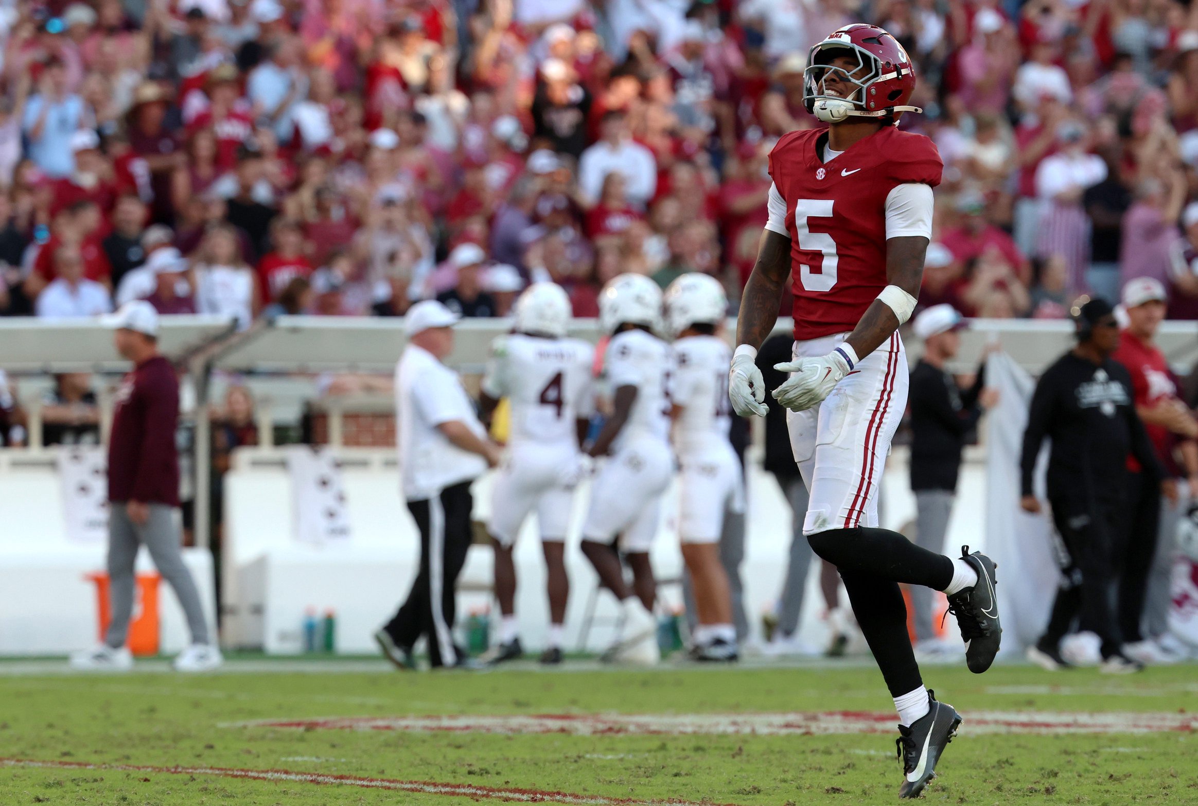 Oct 24, 2026; Tuscaloosa, Alabama, USA;  Alabama Crimson Tide defensive back Dijon Lee Jr. (5) celebrates after forcing a turnover against the Texas A&amp;M Aggies during the second half at Saban Field at Bryant-Denny Stadium.  Mandatory Credit: David Leong-Imagn Images