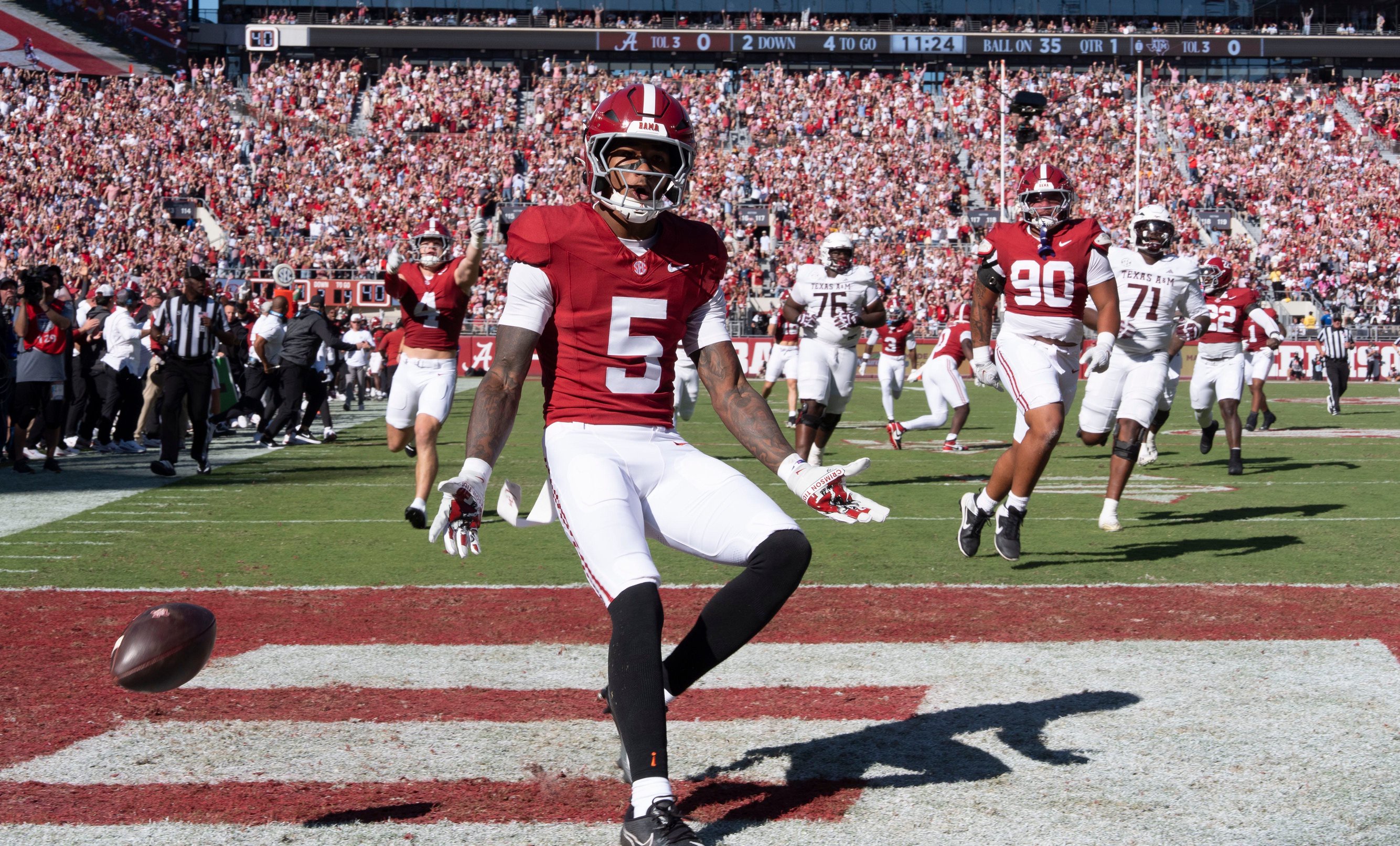 Oct 24, 2026; Tuscaloosa, AL, USA;  Alabama Dijon Lee Jr. (5) celebrates his interception and resulting touchdown against Texas A&amp;M at Saban Field at Bryant Denny Stadium. Mandatory Credit: Gary Cosby Jr.-Tuscaloosa News