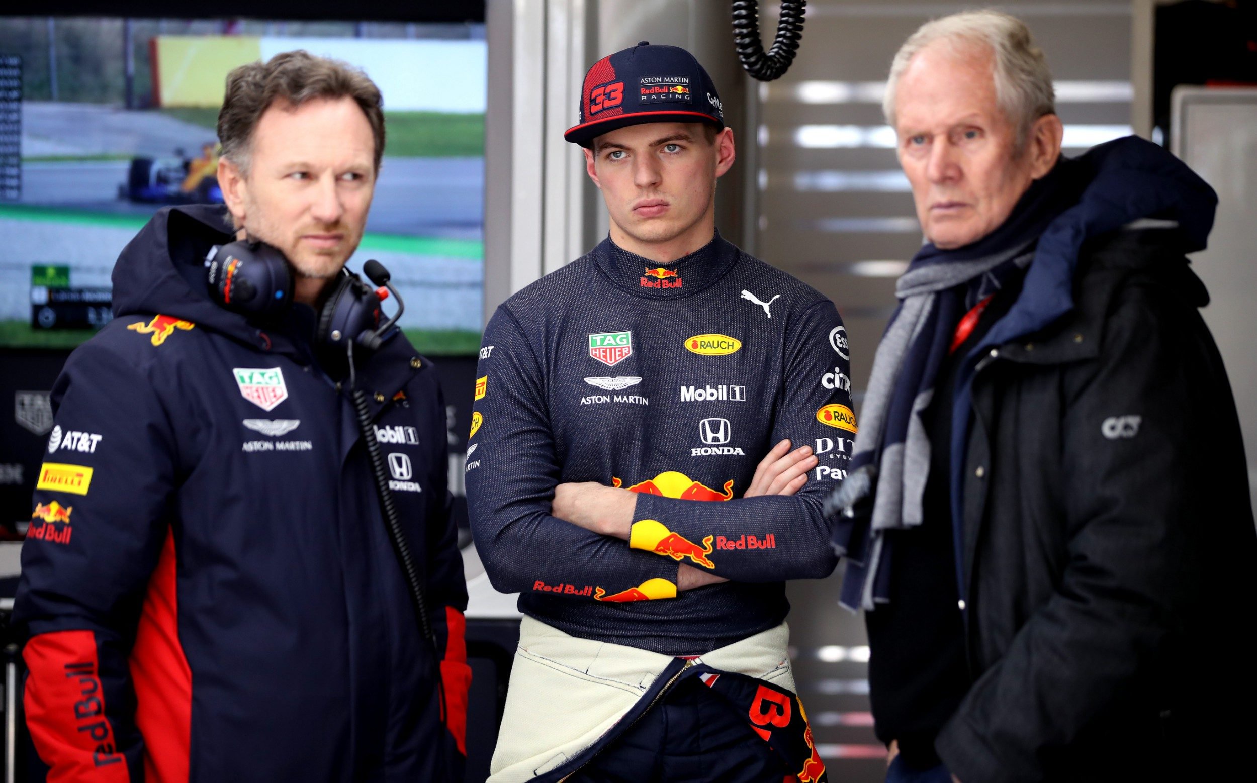Max Verstappen of Netherlands and Red Bull Racing, Red Bull Racing Team Principal Christian Horner and Red Bull Racing Team Consultant Dr Helmut Marko look on in the garage during Day Two of F1 Winter Testing at Circuit de Barcelona-Catalunya on February 27, 2020 in Barcelona, Spain