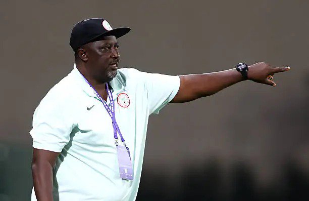 Coach Hakeem Busari pointing the way for the Flamingos Vs North Korea game