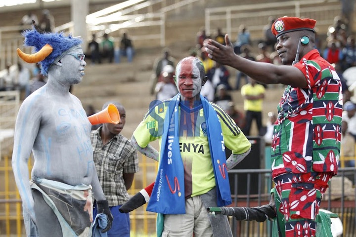 AFC Leopards fan Isaac Juma (C) with his colleagues during a match at Nyayo National Stadium.