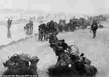 British troops take positions on Sword beach during D-Day, June 6, 1944