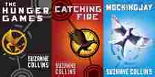 The covers of The Hunger Games, Catching Fire, and Mockingjay by Suzanne Collins