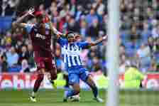 Simon Adingra of Brighton & Hove Albion is fouled by Ezri Konsa of Aston Villa leading to a penalty being awarded during the Premier League mat...