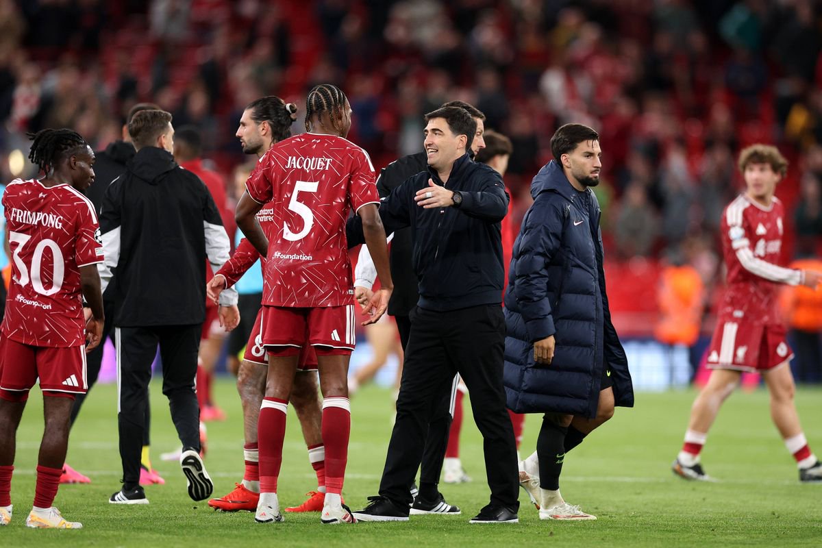 Liverpool head coach Andoni Iraola with Jeremy Jacquet after the UEFA Champions League match against Atletico Madrid at Anfield on September 9 2026 