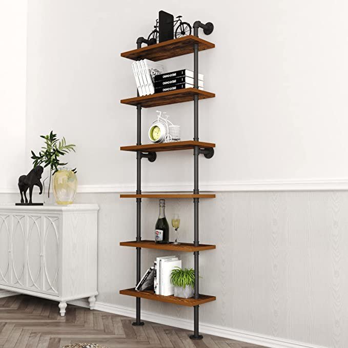 the shelf with stuff on it attached to a wall