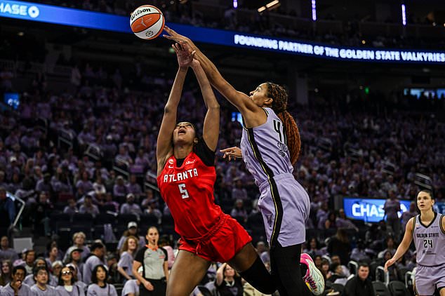 Atlanta Dream forward Angel Reese (5) is blocked by Golden State Valkyries center Kiah Stokes (41) during the second half of Game 2 of the WNBA basketball finals, Monday, Oct. 19, 2026, in San Francisco. (AP Photo/Justine Willard)