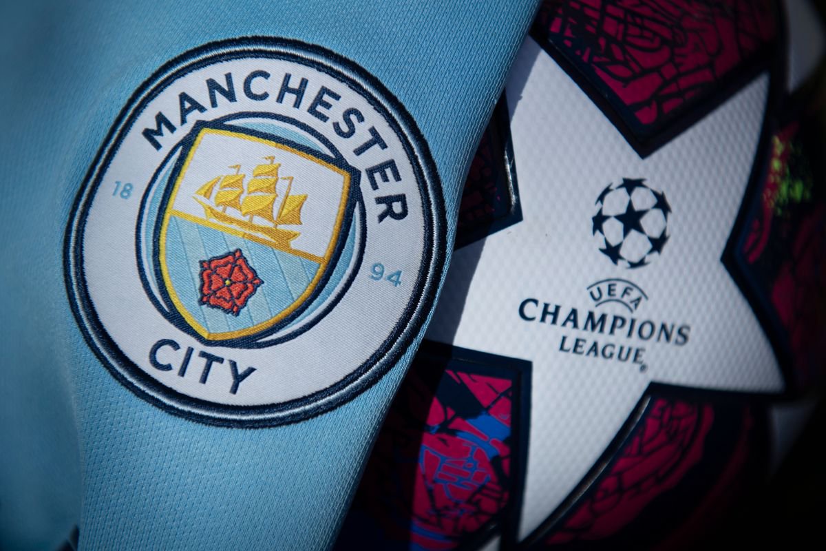 Manchester City and Champions League badges